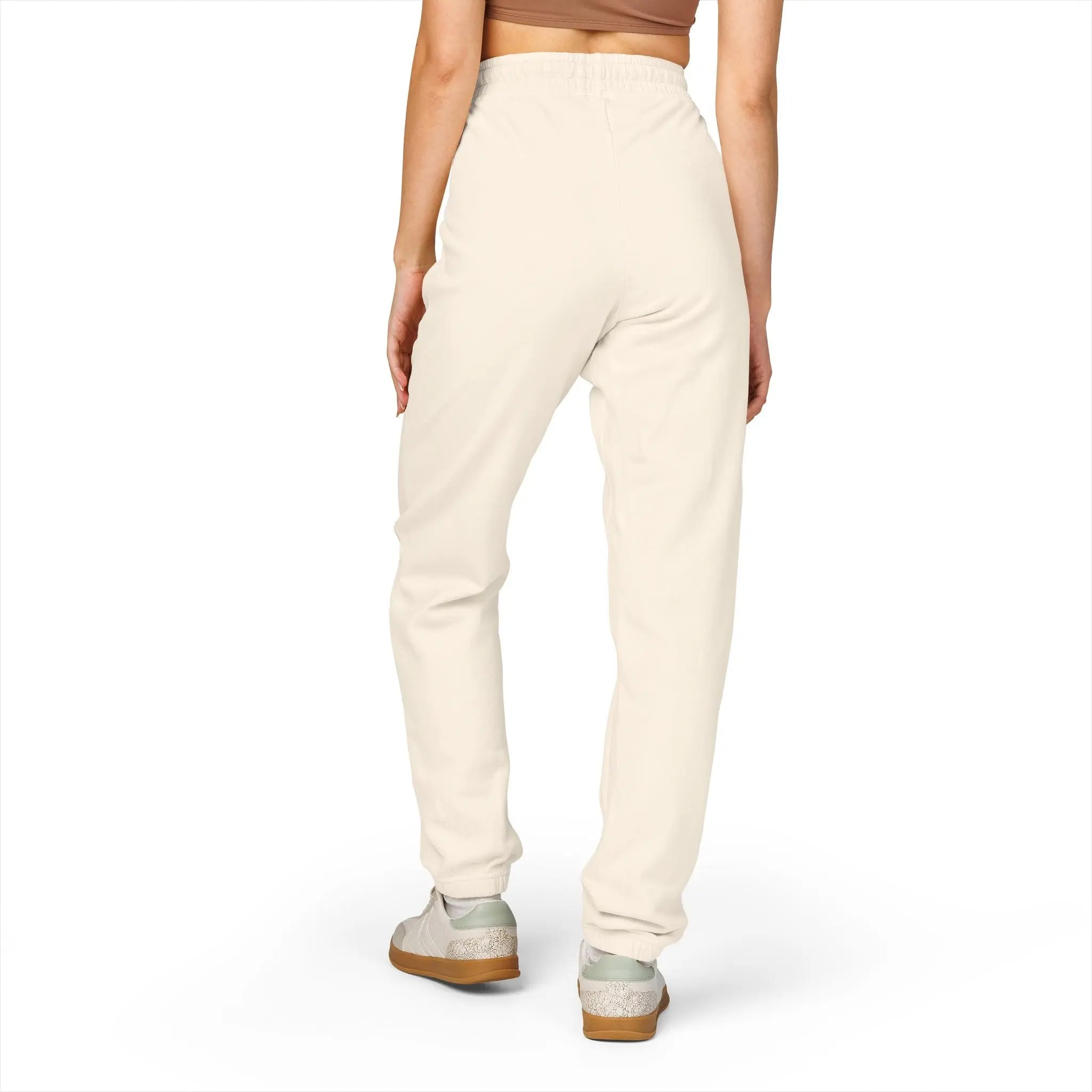 Women's cream jogger pants, soft cotton material, elastic waistband, perfect for casual wear.
