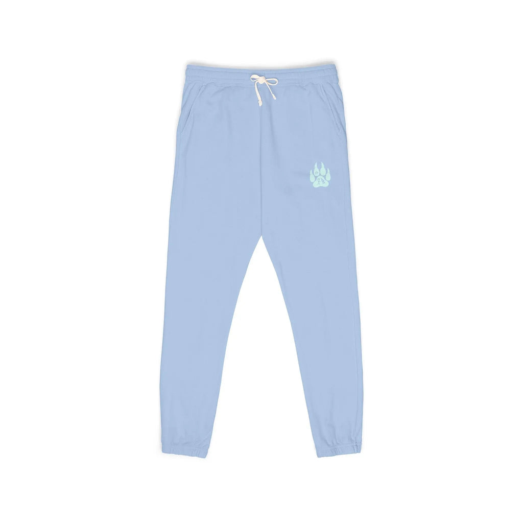 Light blue jogger pants with elastic cuffs and a paw print design, perfect for casual wear.