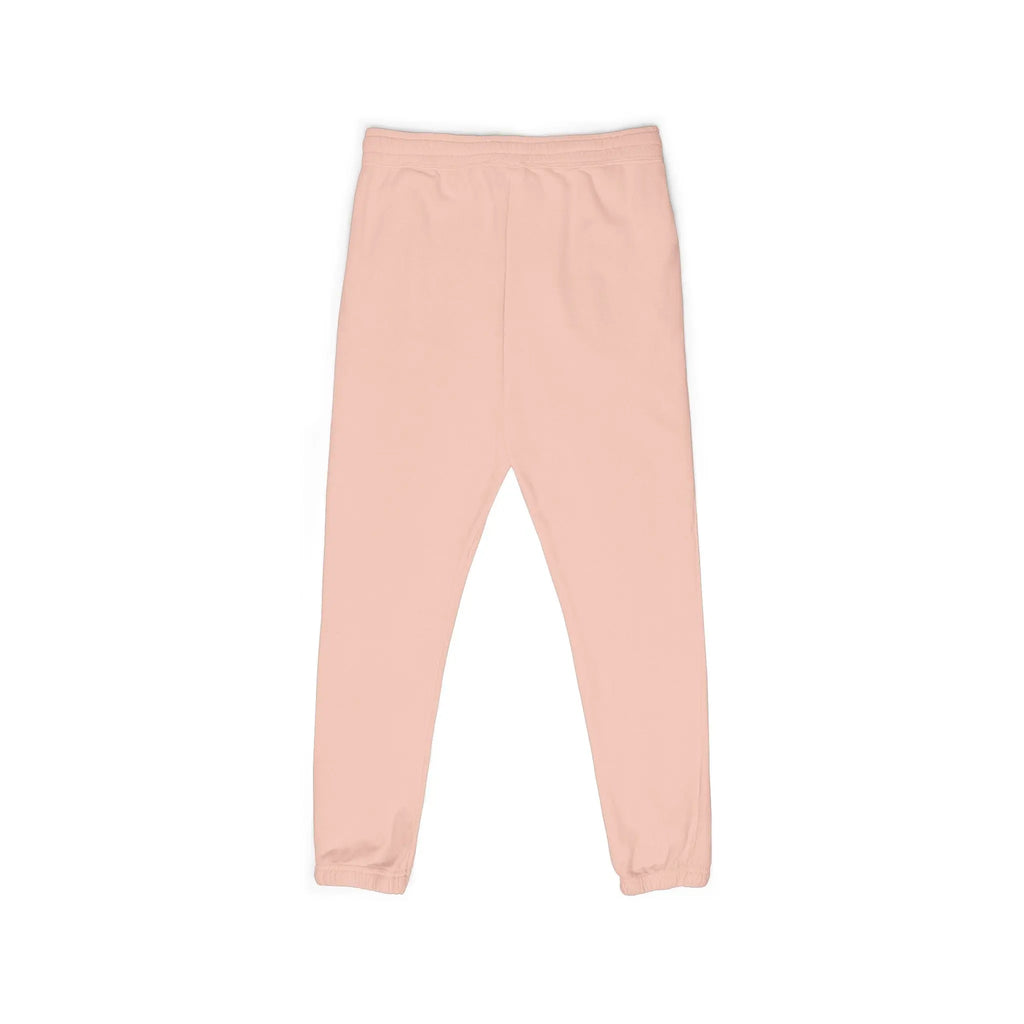Light pink women's jogger pants, soft cotton material, elastic waistband for comfort.