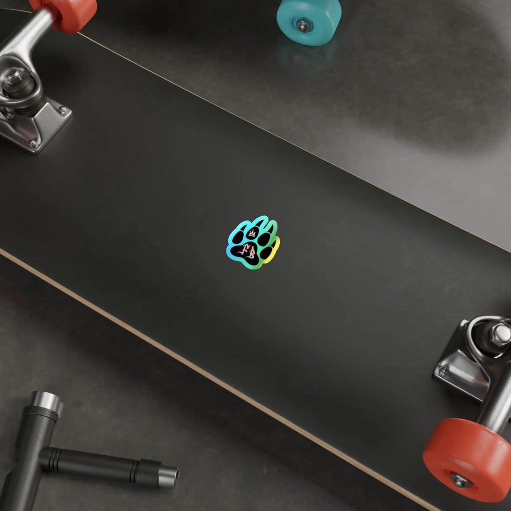 Black skateboard with colorful paw print design and orange wheels, perfect for skaters of all levels.