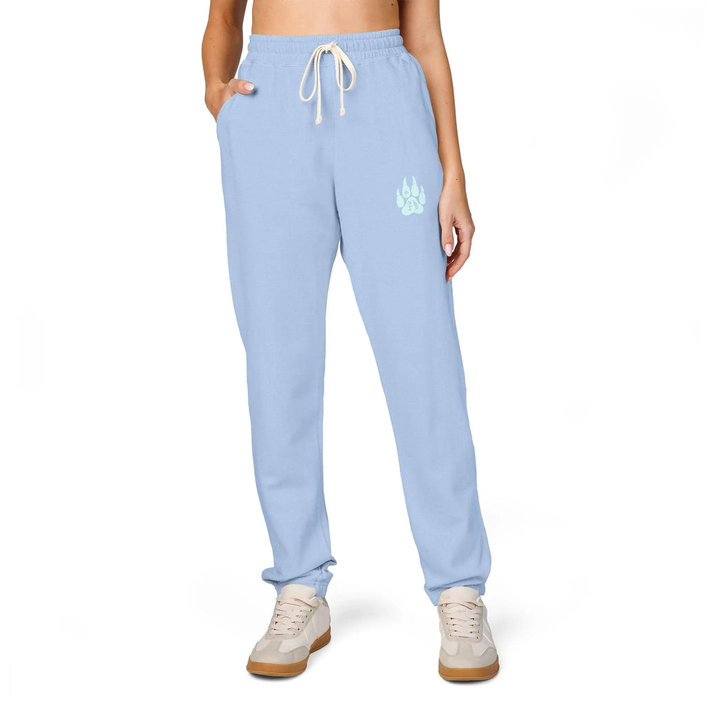 Light blue sweatpants for women with pockets and a cute paw print, perfect for casual wear.