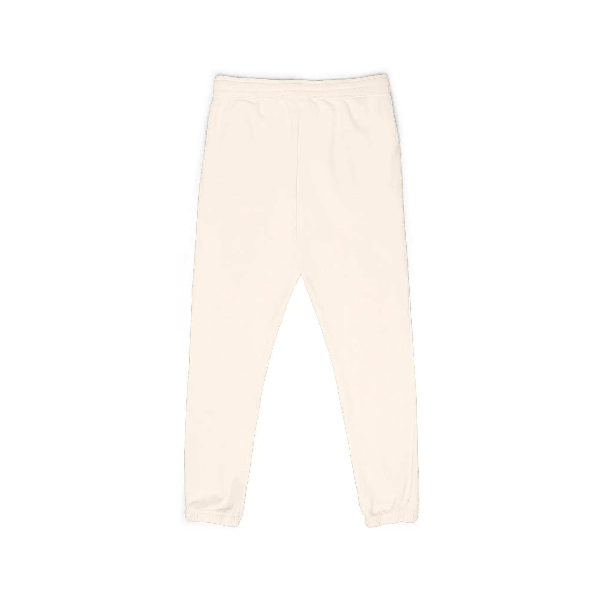 Soft cream cotton jogger pants with elastic waistband and cuffed ankles for comfort and style.