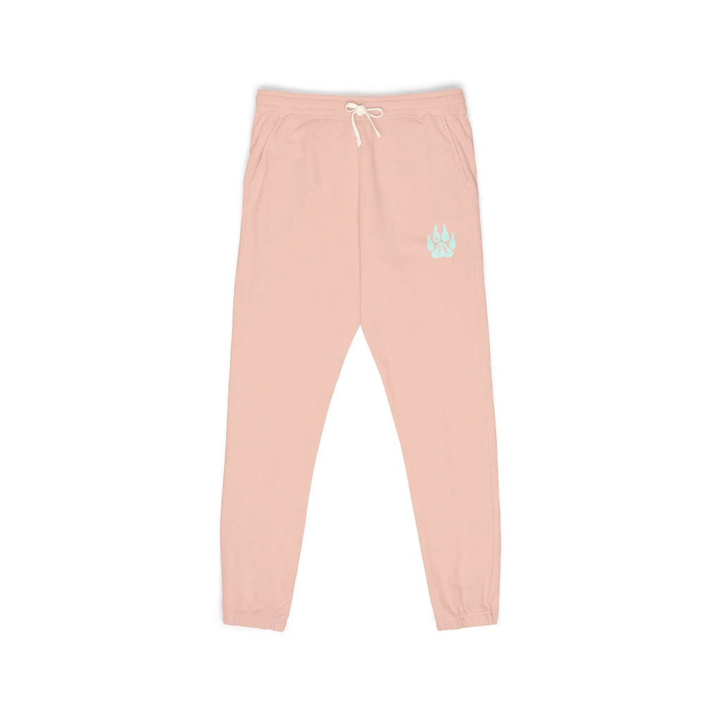 Soft pink jogger pants with a light blue paw print, featuring an elastic waist and side pockets.