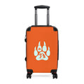 Orange hard-shell suitcase with a blue paw print design and retractable handle.