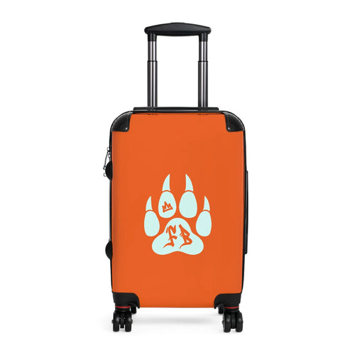 Orange hard-shell suitcase with a blue paw print design and retractable handle.