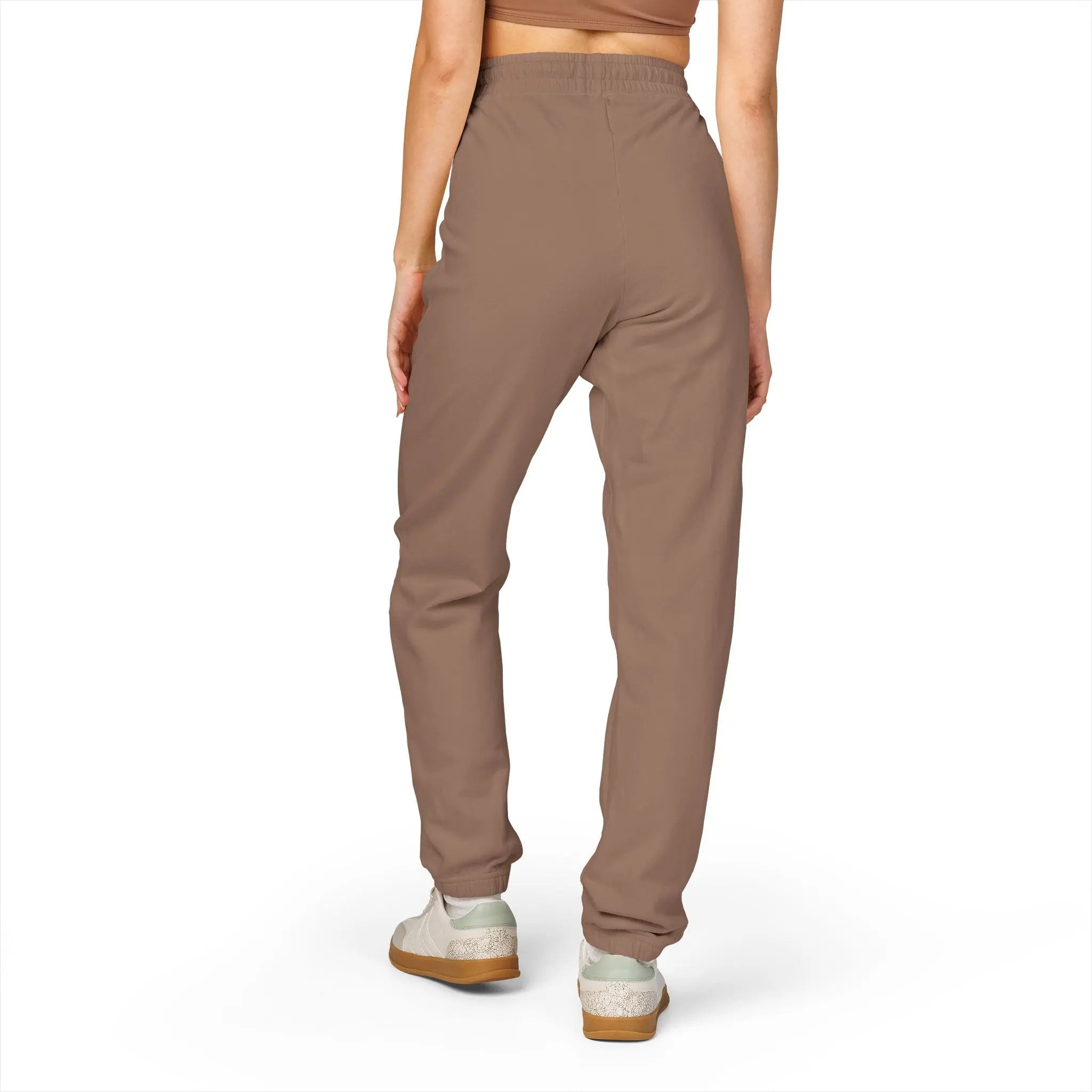 Women's brown jogger pants, made of soft fabric with elastic waistband for comfort and style.