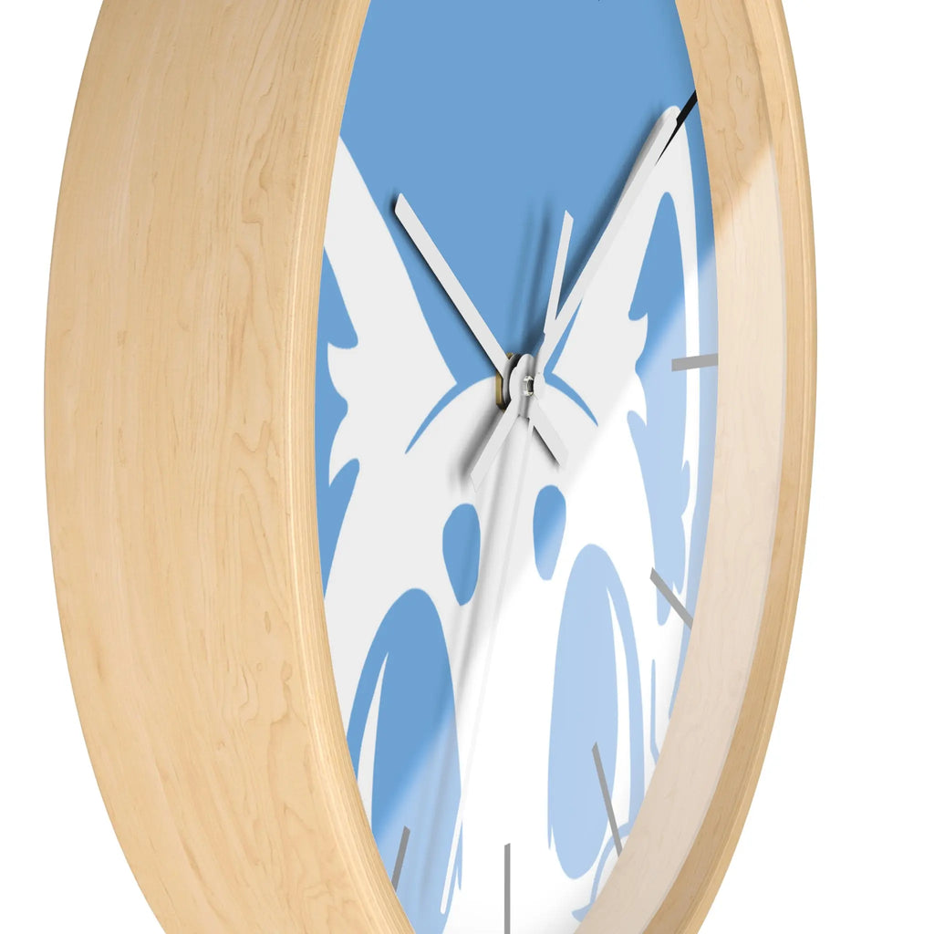 Stylish wall clock with light blue face and minimalist design, featuring a wood frame and silver hands.