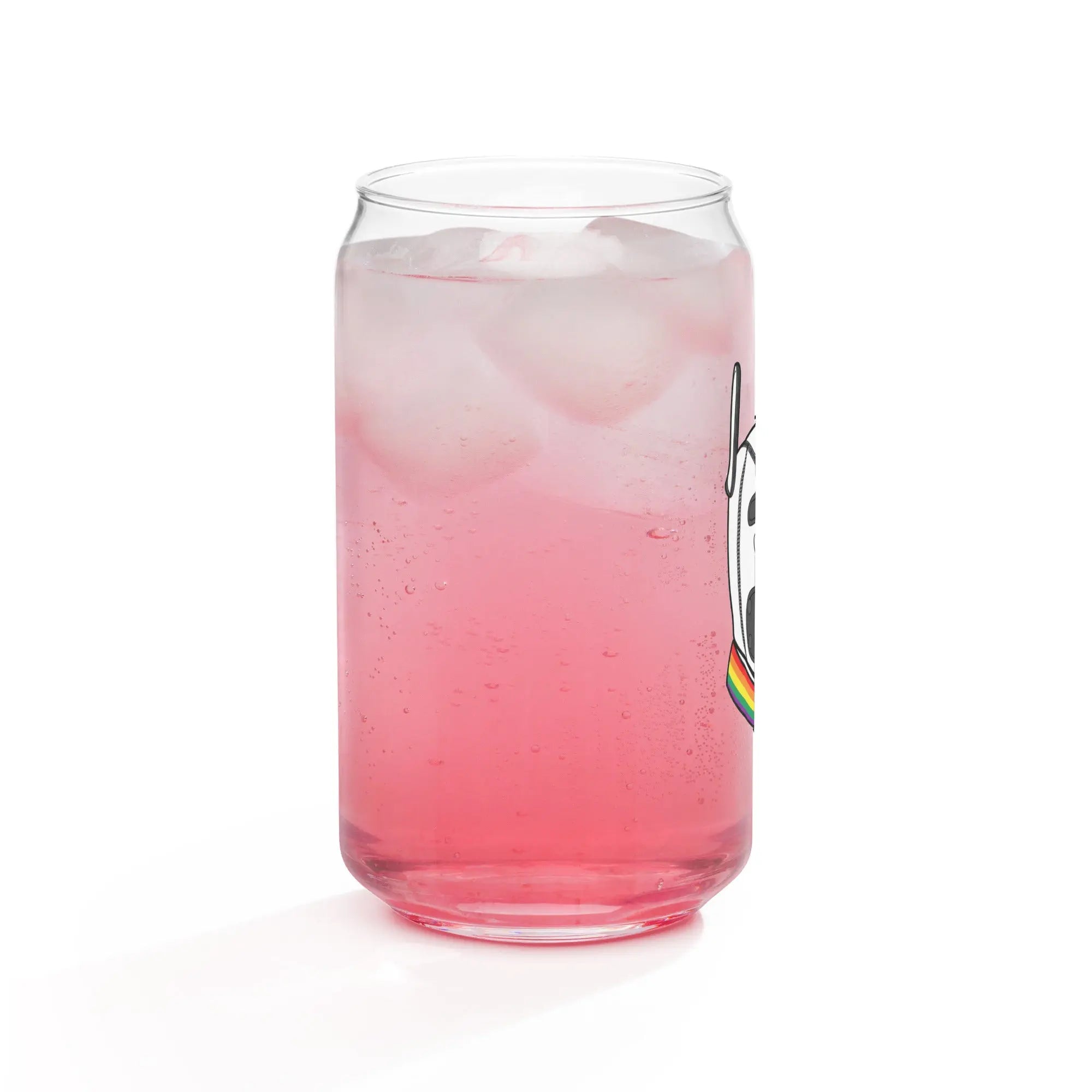 Pink soda in a transparent glass featuring a playful unicorn design, perfect for summer drinks.