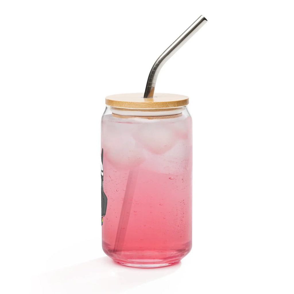 Glass jar with bamboo lid and stainless steel straw, filled with pink drink and ice, featuring a playful design.
