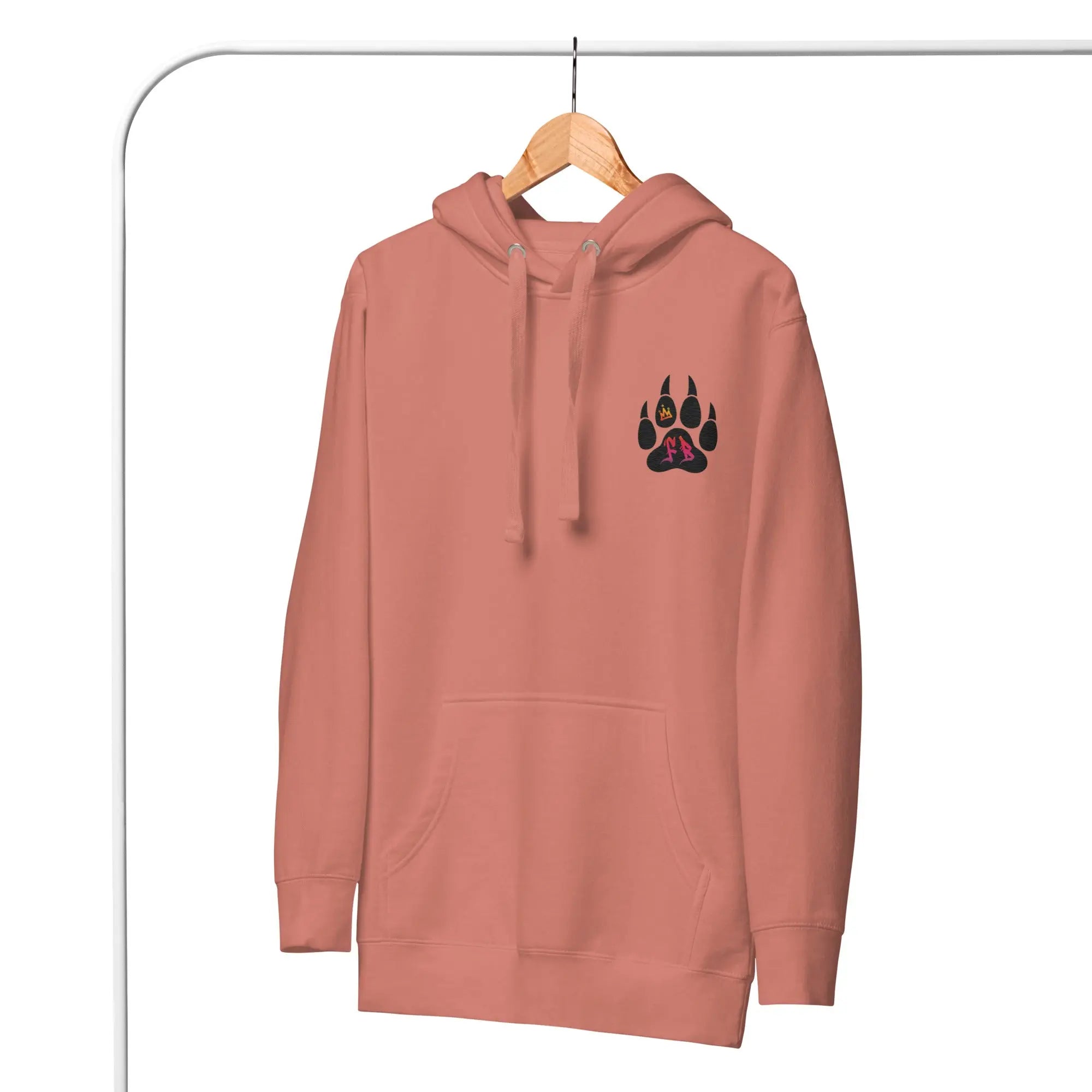 Coral pink hoodie with a black paw print design, featuring a pocket and drawstring hood, cozy fabric.