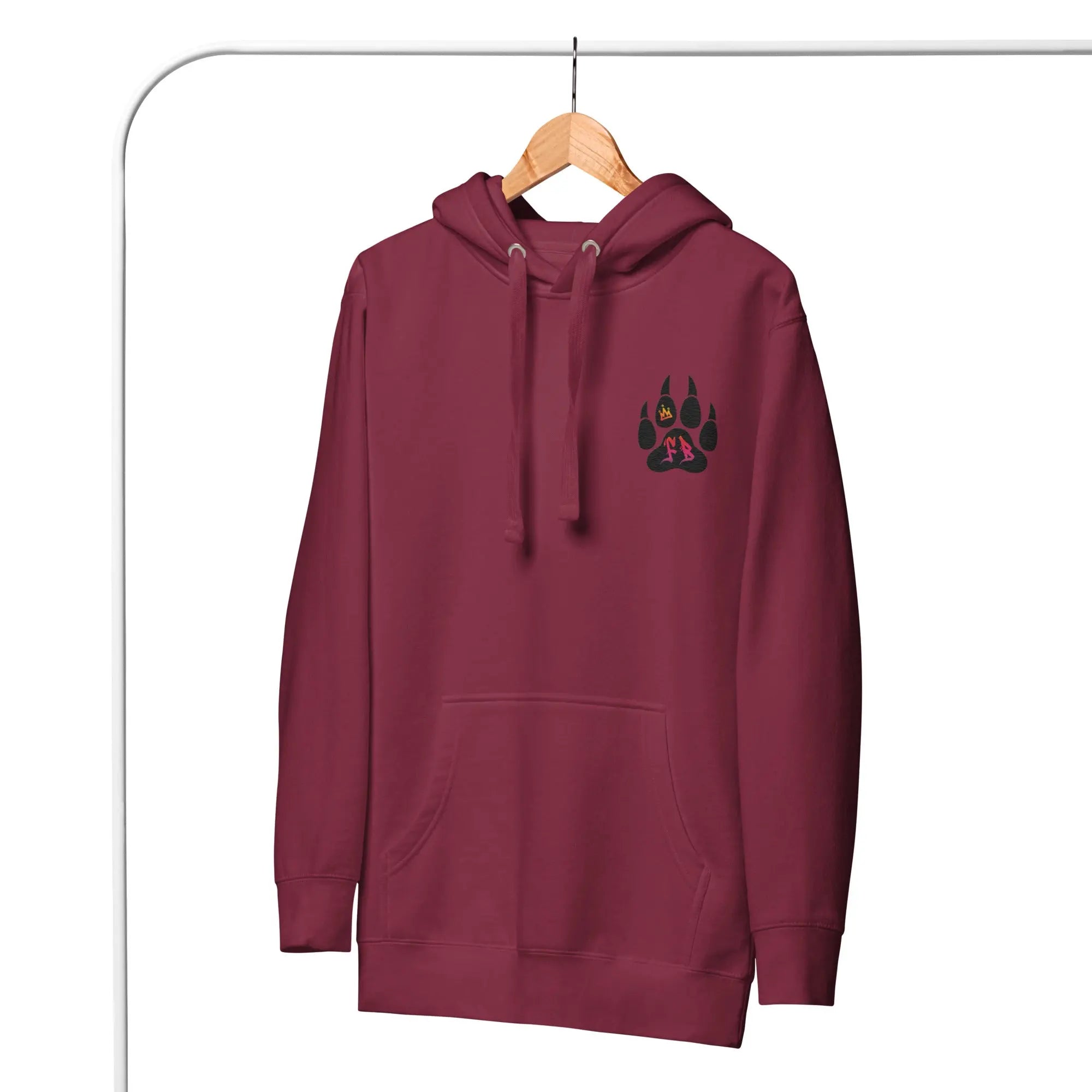 Maroon hoodie with paw print design, soft fabric, and front pocket for comfort and style.