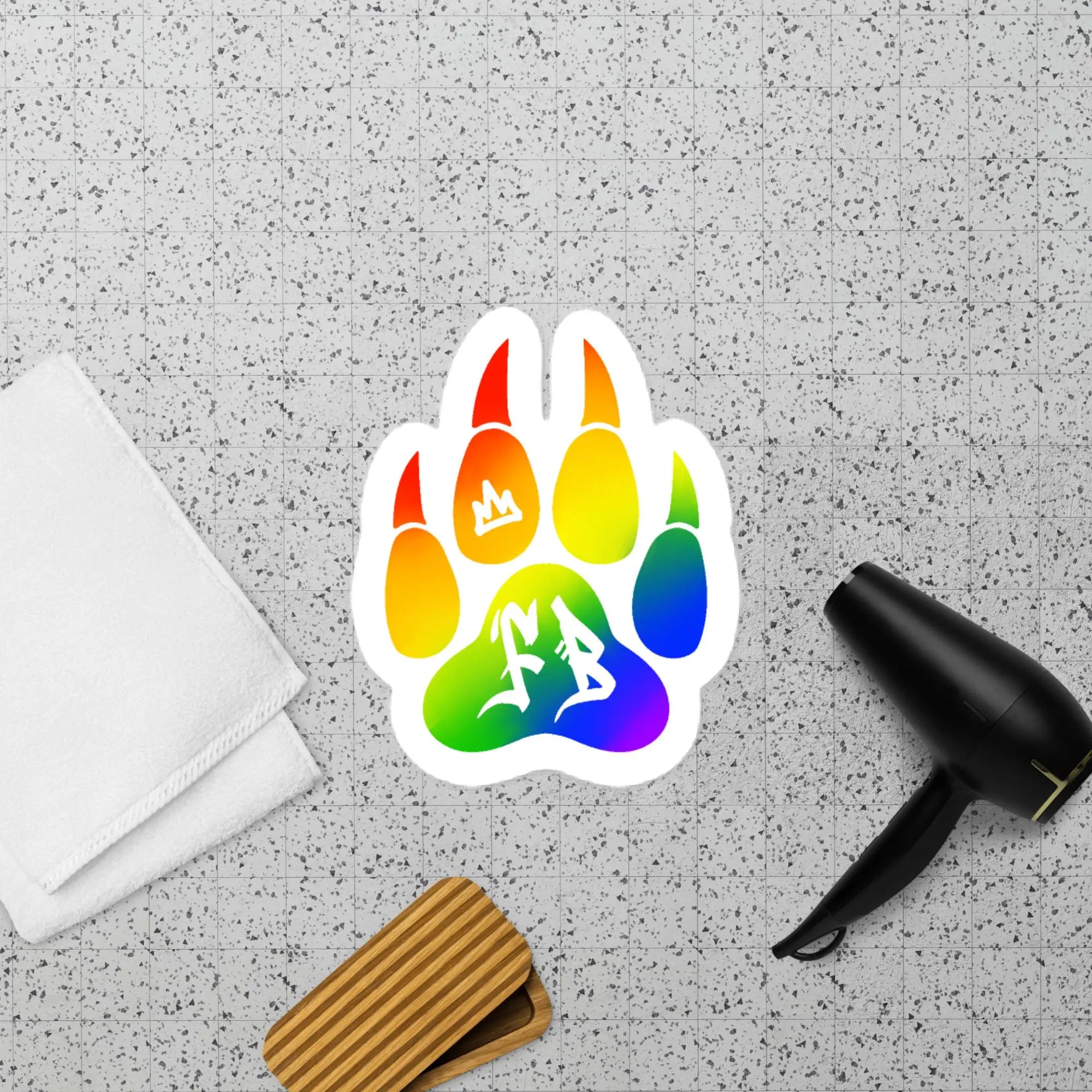 Colorful rainbow paw print sticker with artistic designs, perfect for pet lovers and pride supporters.