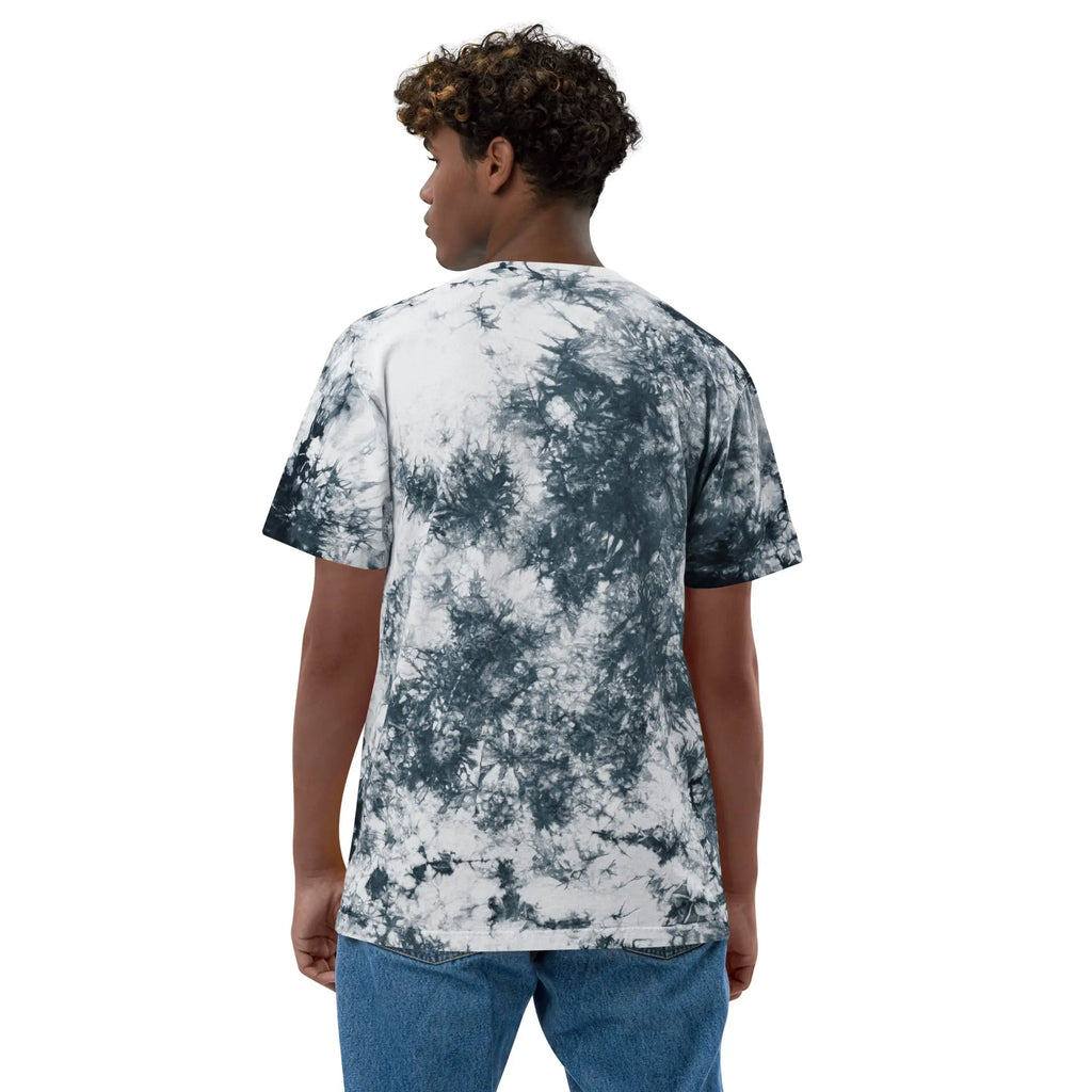 Back view of a tie-dye t-shirt in black and white, made from soft cotton, perfect for casual wear.
