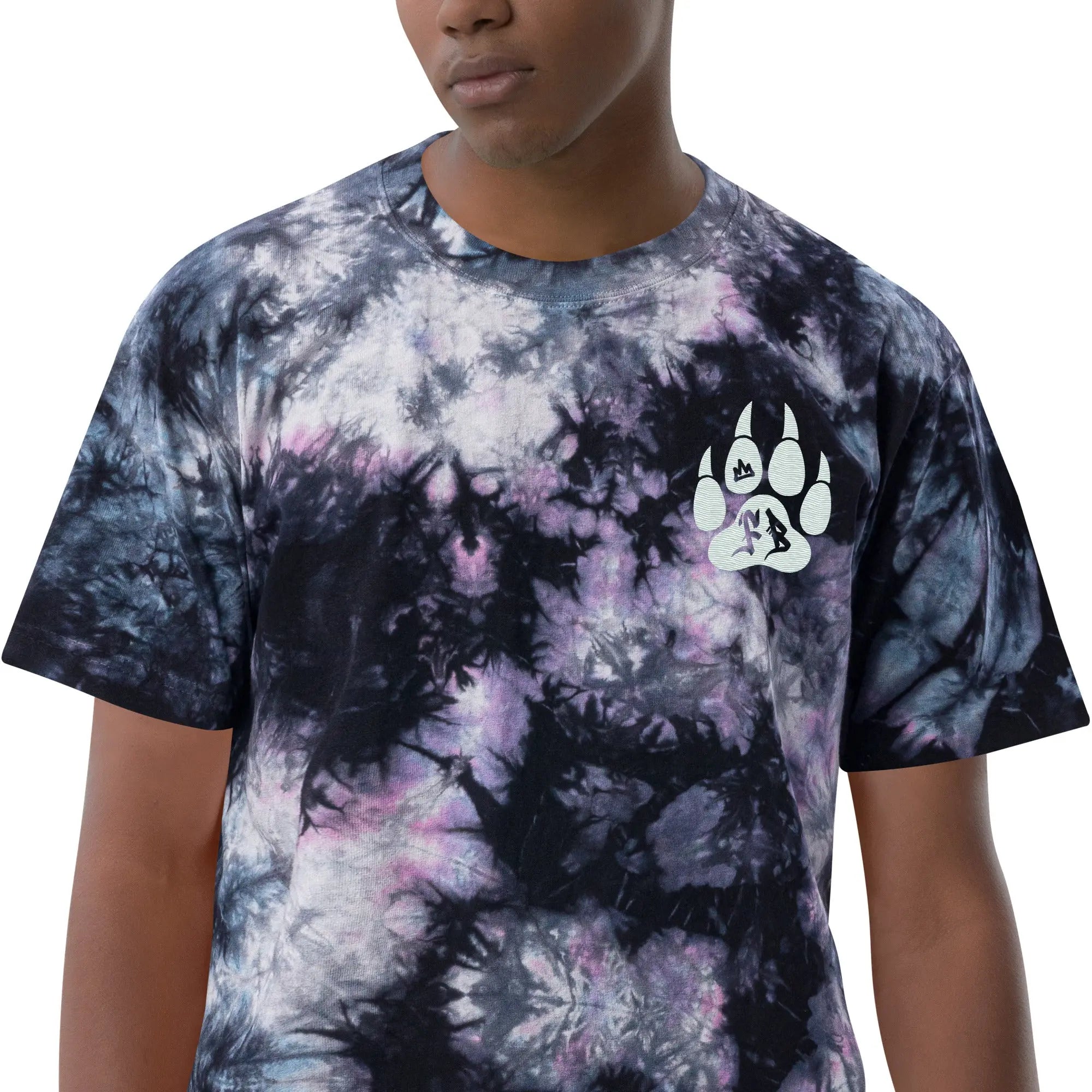 Men's tie-dye t-shirt in black, purple, and blue with a paw logo on the chest, made from soft cotton.