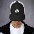 Black and white snapback cap featuring a paw print design, perfect for outdoor enthusiasts.