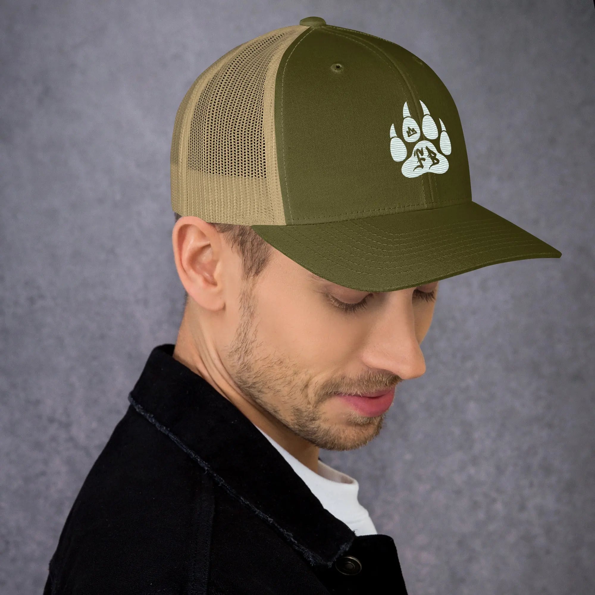 Olive green mesh snapback cap with white paw print design, suitable for outdoor activities.