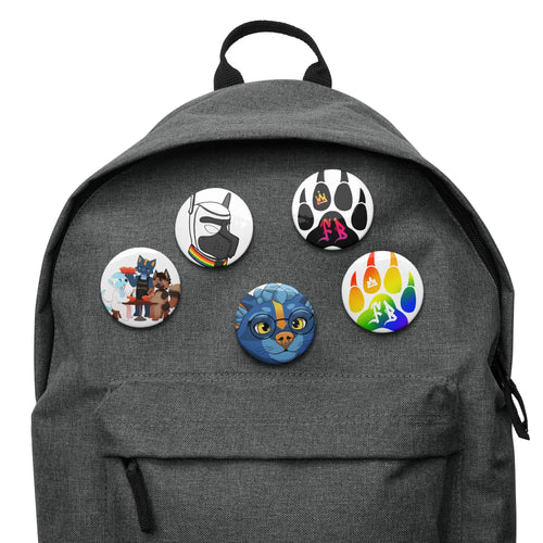 Set of colorful cat-themed buttons on a gray backpack, featuring various designs and playful graphics.