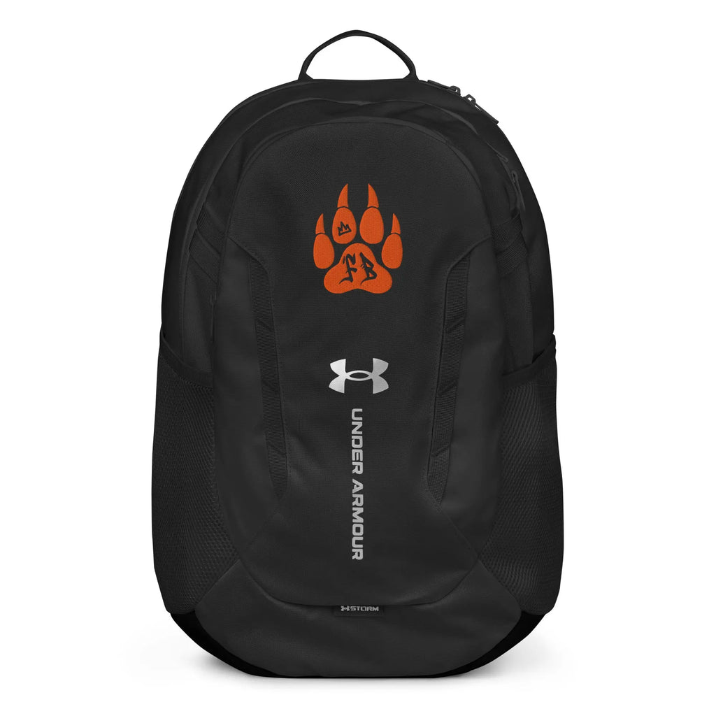 Black Under Armour backpack with orange paw print and logo, durable, water-resistant design.