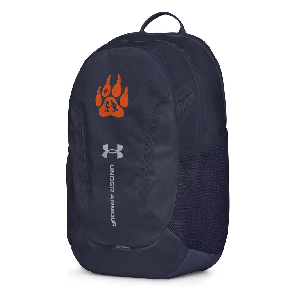 Under Armour navy backpack with orange bear paw logo, durable material, perfect for sports and everyday use.