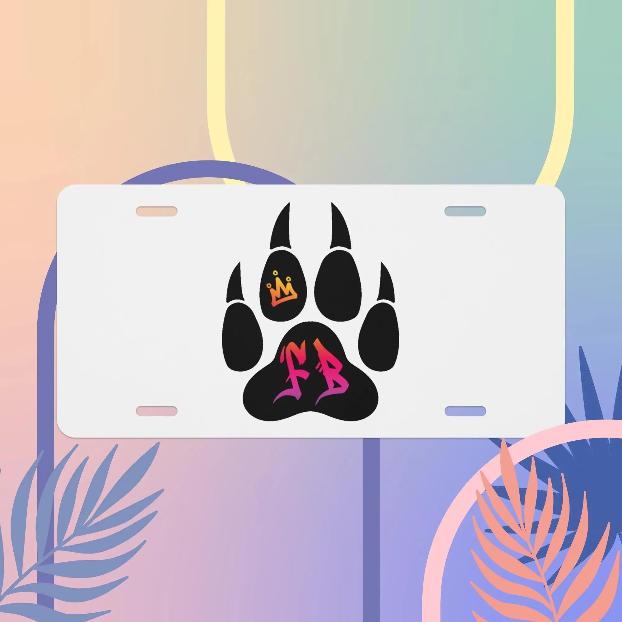 Custom white license plate with black paw print design and colorful crown, perfect for pet lovers.